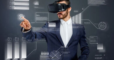 A business professional wearing a VR headset interacting with a virtual interface, representing AR and VR design solutions and immersive digital technology.